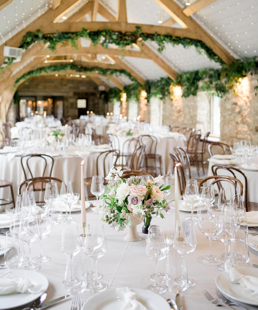 Healey Barn wedding venue with tables set up for wedding breakfast